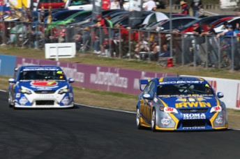 thumb Lee Holdsworth leads Tim Slade at Queensland Raceway