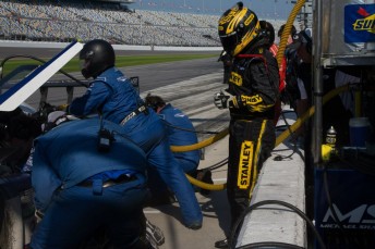 Marcos Ambrose waiting to get aboard the Riley-Ford