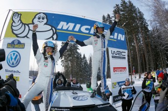 Sebsatien Ogier (right) and co-driver Julien Ingrassia celebrate in Sweden