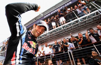 thumb Mark Webber celebrates after winning the British Grand Prix – one of four wins this year