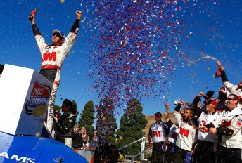 61913766 Greg Biffle in Victory Lane with a very happy #16 crew, who will share a $100,000 bonus offered pre-race by Ford Racing