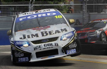 thumb James Courtney leads Jamie Whincup at the Sydney Telstra 500 street track yesterday