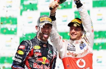 thumb Webber and Button celebrate
