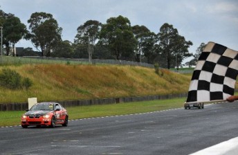 thumb Chaz Mostert takes the chequered flag