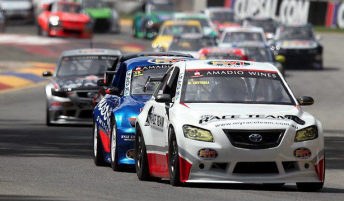 cat Cottrell leads the field at the Clipsal 500 street circuit – his home track