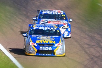 car Lee Holdsworth leads Stone Brothers Racing's Tim Slade