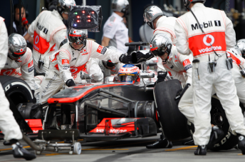 Jenson Button takes service