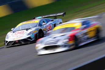 Steven Richards speeds past a Ginetta on the front straight