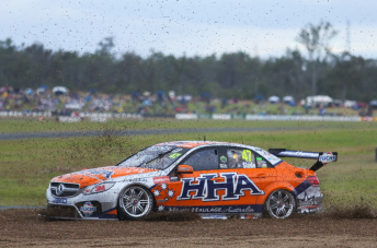Tim Slade surfs through Turn 3 gravel