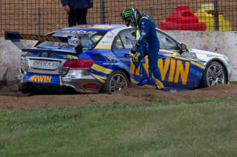 Holdsworth lost control of his Mercedes after dropping a wheel off on the Turn 4 entry