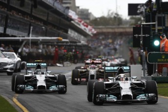 Lewis Hamilton leads Mercedes team-mate Nico Rosberg out of the pitlane in Melbourne