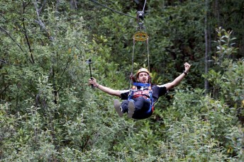 Coulthard flying through the Hollybank Treetops Adventure in Tasmania