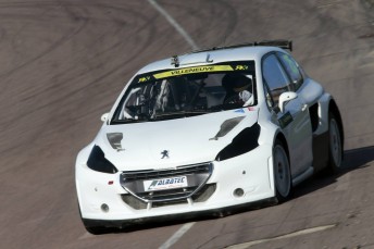 Villeneuve testing his Peugeot 208 at Lydden Hill