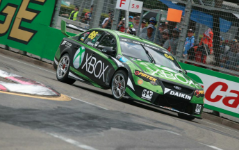 Marcos Ambrose heads to the escape road after his Saturday qualifying crash