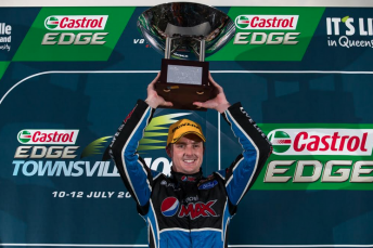 Mark Winterbottom celebrates victory in Race 16