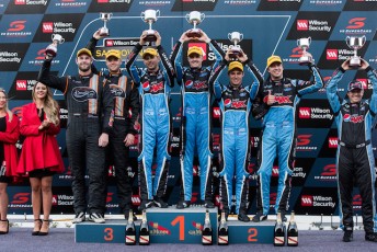 Mark Winterbottom and Steve Owen celebrate victory at the Wilson Security Sandown 500