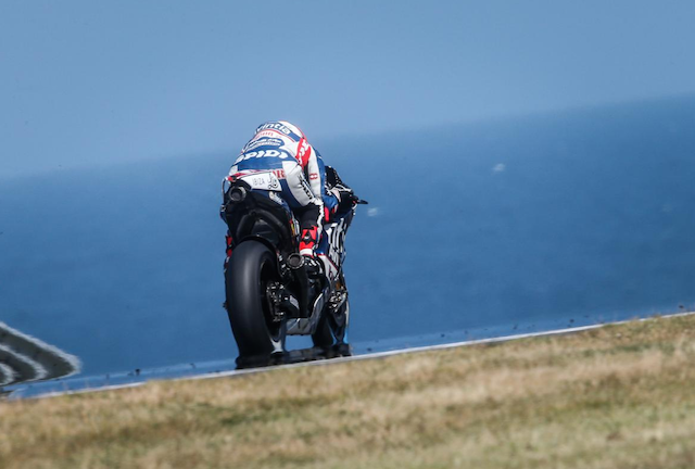 Hector Barbera (Avintia Ducati) cuts a stunning figure against the backdrop of Bass Strait