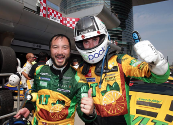 Darryl O'Young (left) celebrates GT Asia title triumph