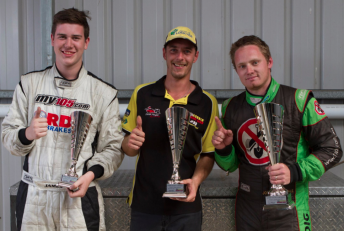 Jon McCorkindale (centre) celebrates round win