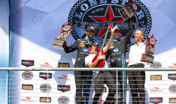 Brothers Ricky and Jordan Taylor celebrate after their Lone Star Le Mans win