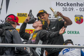 Joey Mawson celebrates his title win with a 'shoey'
